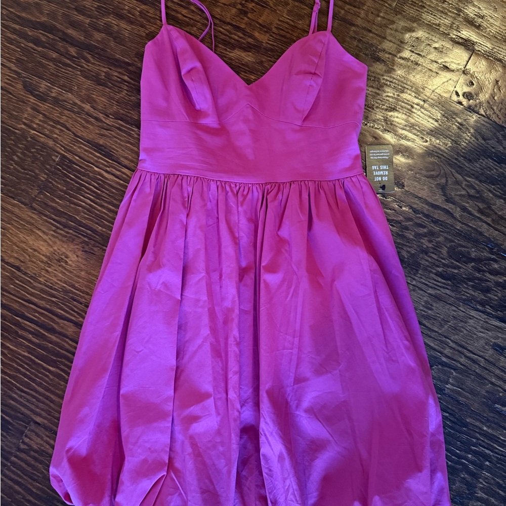 Express bubble hem mini dress in fuchsia.